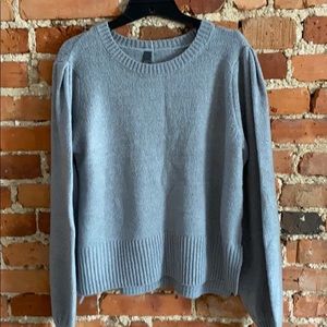 Sweater with bell sleeves and buttons on back